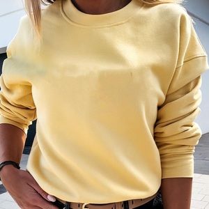 yellow crewneck